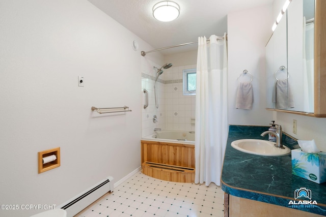 4477 Panther Dr, Eagle River, AK 99577 - full bathroom featuring bathing tub / shower combination, tile patterned floors, vanity, a baseboard radiator, and baseboards
