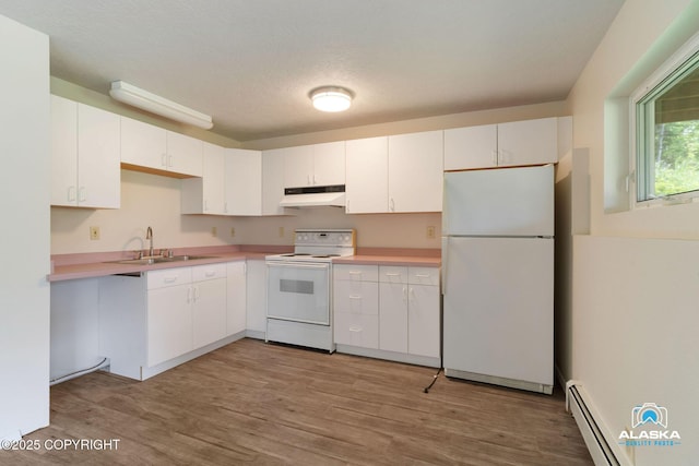 4477 Panther Dr, Eagle River, AK 99577 - kitchen with white appliances, a baseboard radiator, under cabinet range hood, light wood-style flooring, and a sink