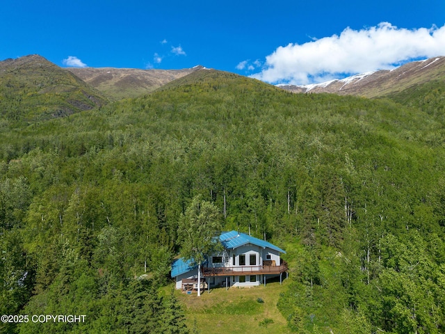 4477 Panther Dr, Eagle River, AK 99577 - mountain view with a heavily wooded area