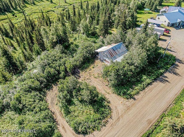 birds eye view of property featuring a rural view