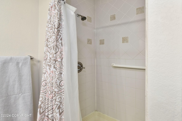 bathroom featuring walk in shower