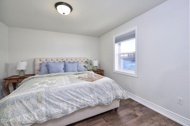 bedroom featuring wood-type flooring