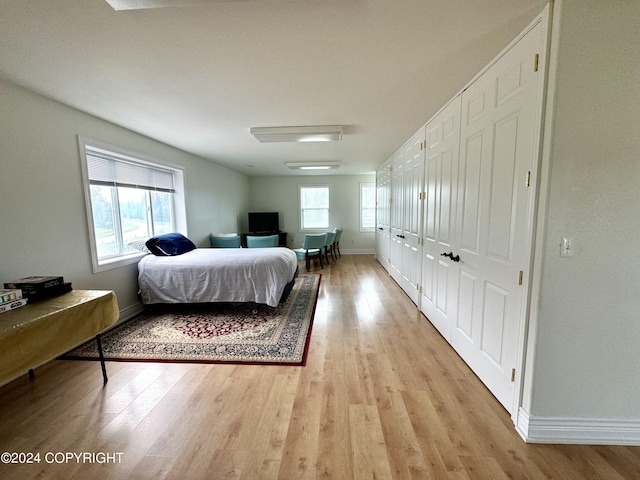 bedroom featuring light wood-type flooring