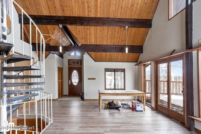 foyer with hardwood / wood-style floors, high vaulted ceiling, wooden ceiling, and beamed ceiling