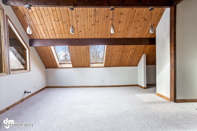 additional living space with a healthy amount of sunlight, lofted ceiling with skylight, carpet, and wooden ceiling