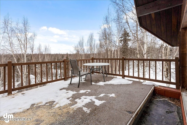 view of snow covered deck