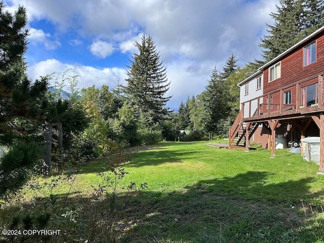 view of yard with a deck