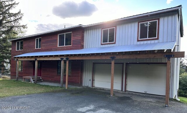 view of front of home featuring a garage