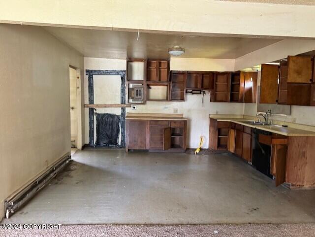 kitchen featuring concrete floors and sink