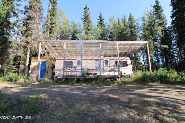 view of front of home featuring a wooden deck