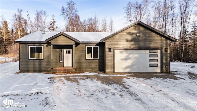 single story home with a garage