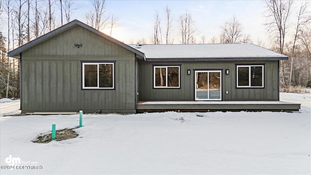 view of snow covered property