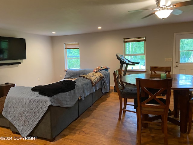 bedroom featuring wood-type flooring and ceiling fan