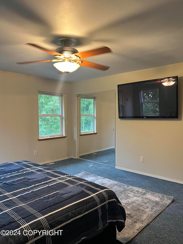 unfurnished bedroom with carpet flooring and ceiling fan