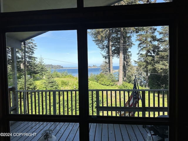 wooden deck featuring a water view