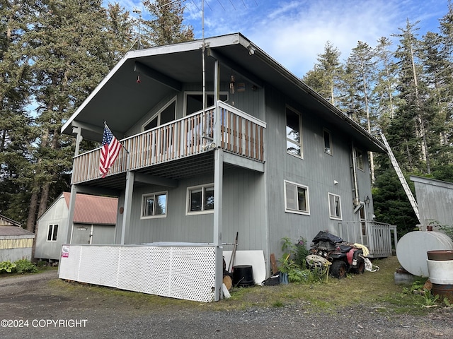 view of property exterior with a balcony