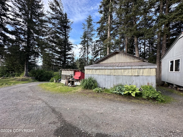 exterior space with an outbuilding