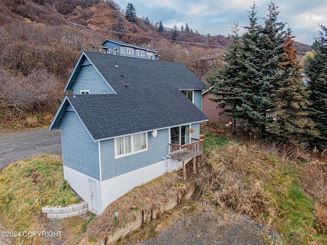 view of home's exterior with a mountain view