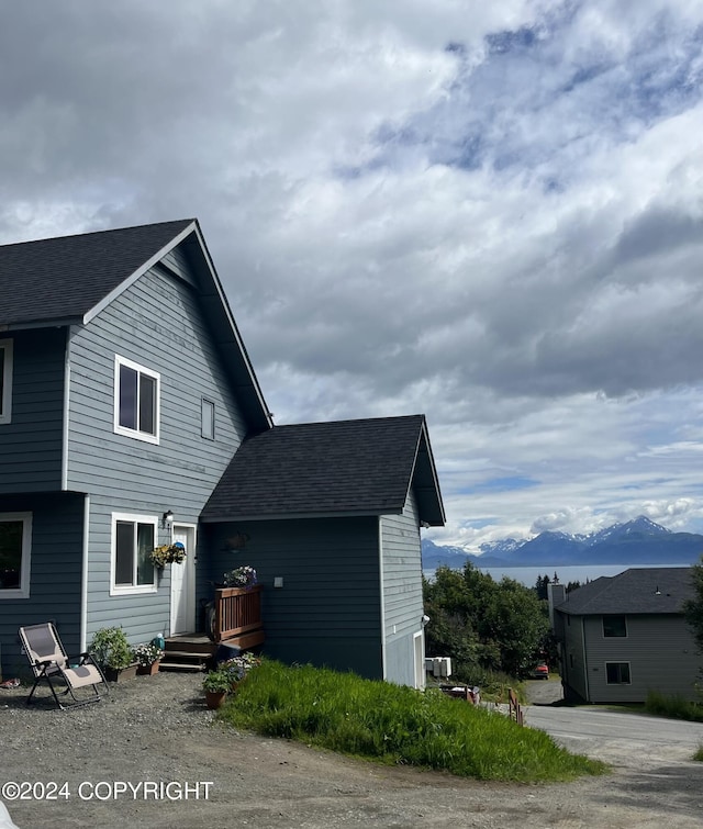 view of front facade featuring a mountain view