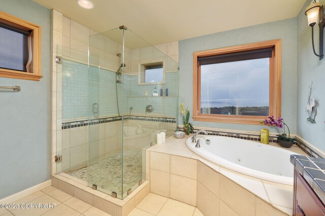 bathroom featuring independent shower and bath and tile patterned floors