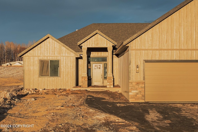 view of front of home featuring a garage