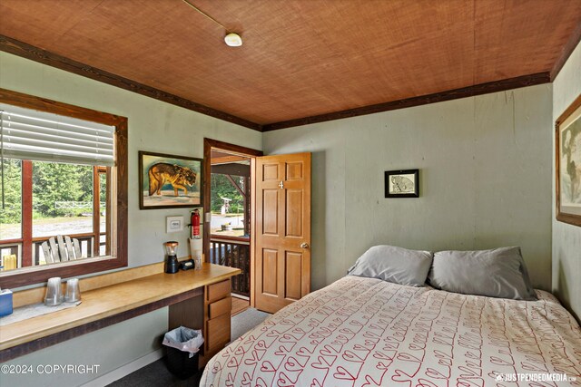 bedroom featuring wooden ceiling and carpet