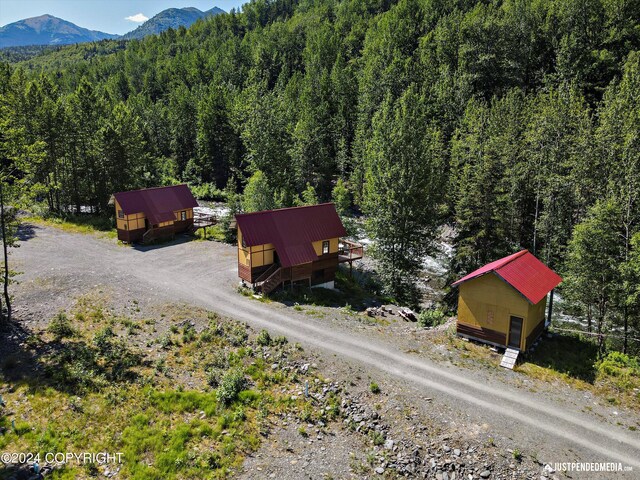 drone / aerial view featuring a mountain view