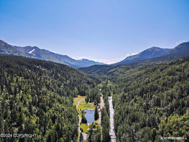 mountain view with a water view