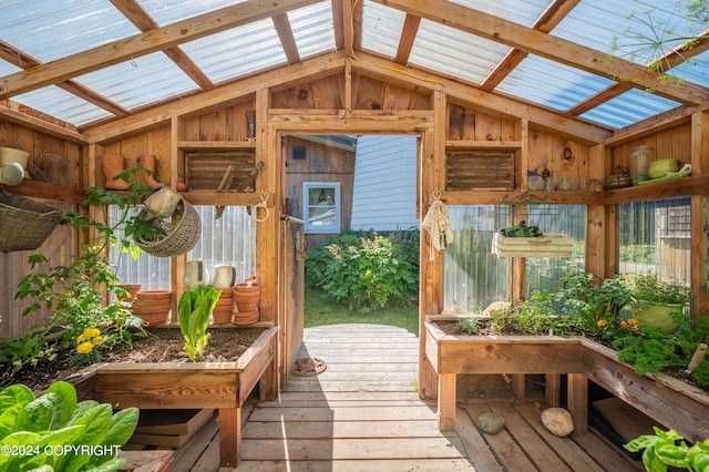 sunroom / solarium with lofted ceiling