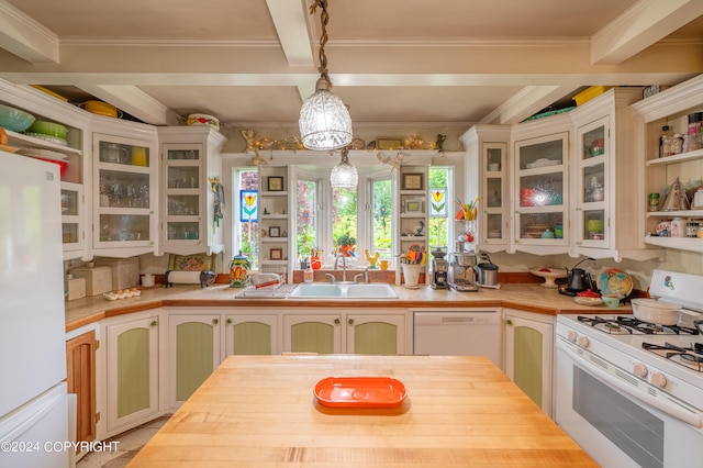 kitchen with sink, wooden counters, ornamental molding, and white appliances