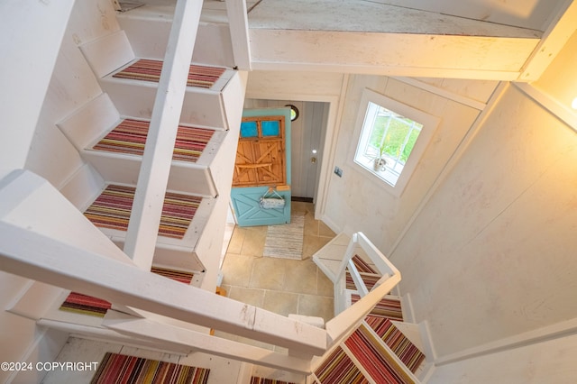 stairs with tile patterned flooring