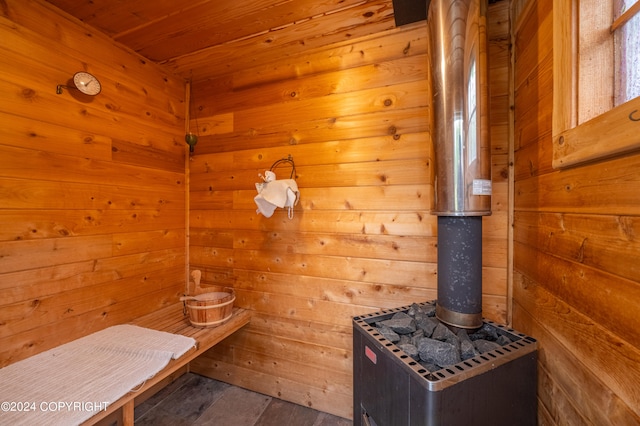 view of sauna featuring wood-type flooring, wood walls, and wood ceiling