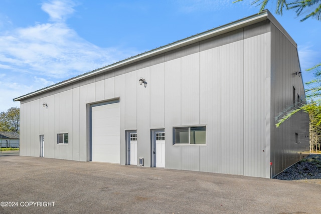 view of outbuilding with a garage