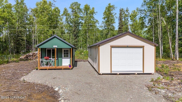 view of front of house featuring an outbuilding