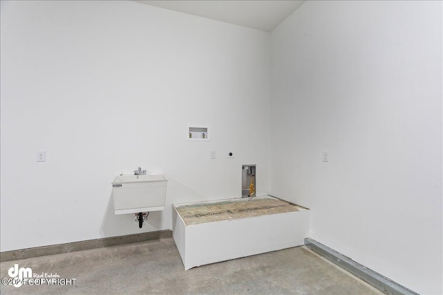 laundry area featuring hookup for a washing machine, hookup for an electric dryer, and sink