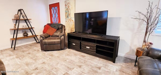 sitting room with light hardwood / wood-style floors