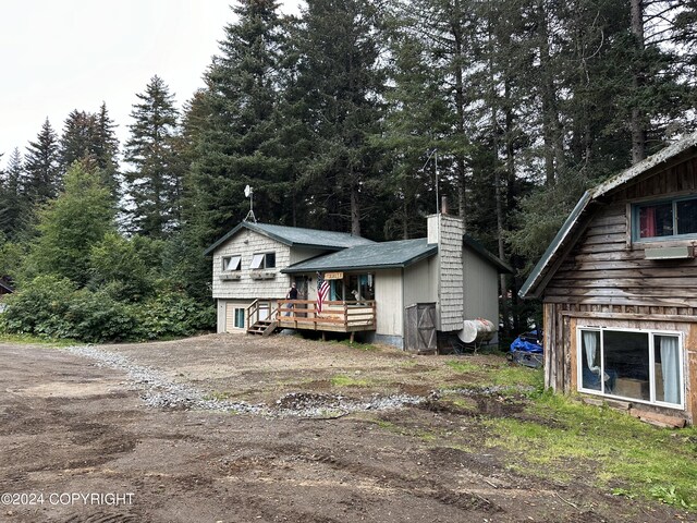 view of front of home with a deck