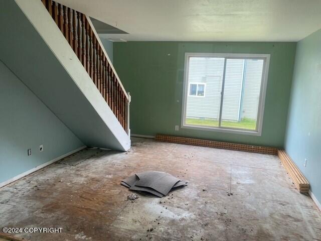 unfurnished living room with a healthy amount of sunlight