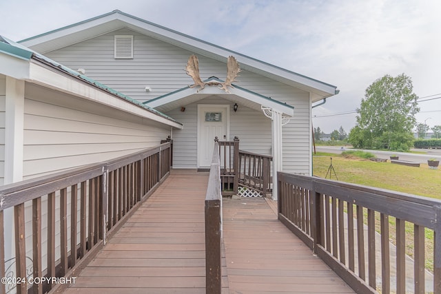 exterior space featuring a yard and a deck