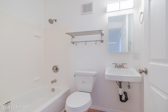 full bathroom with toilet, bathing tub / shower combination, and sink