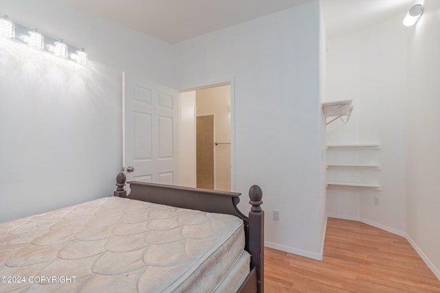 bedroom featuring light wood-type flooring