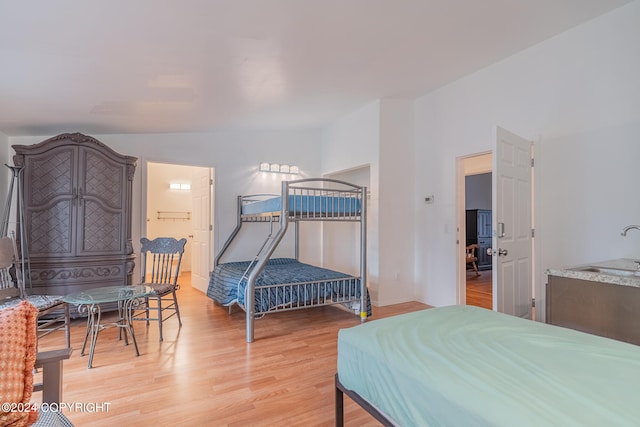 bedroom featuring light wood-type flooring