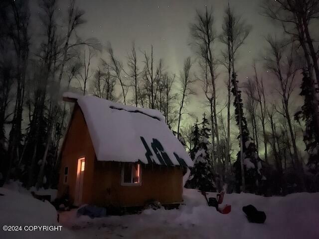 view of snow covered property