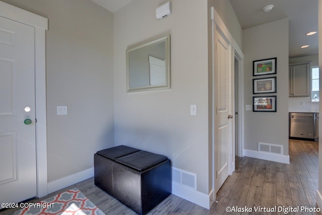 hallway featuring light hardwood / wood-style flooring