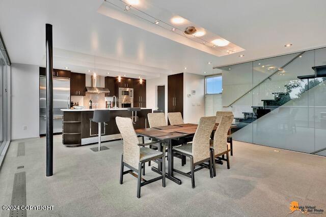 dining room with stairs