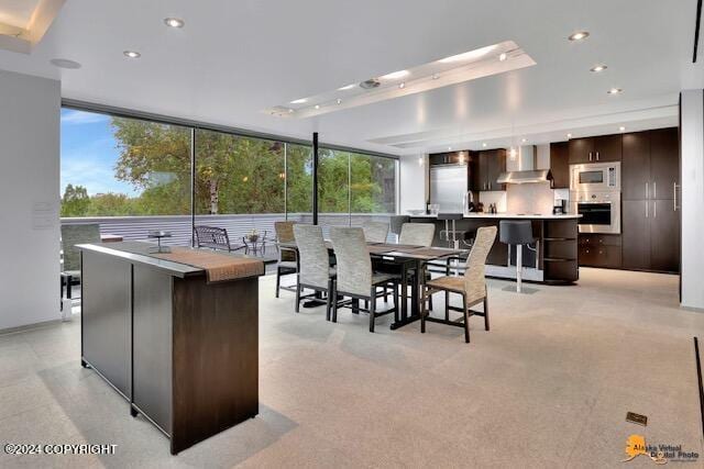 dining space featuring recessed lighting