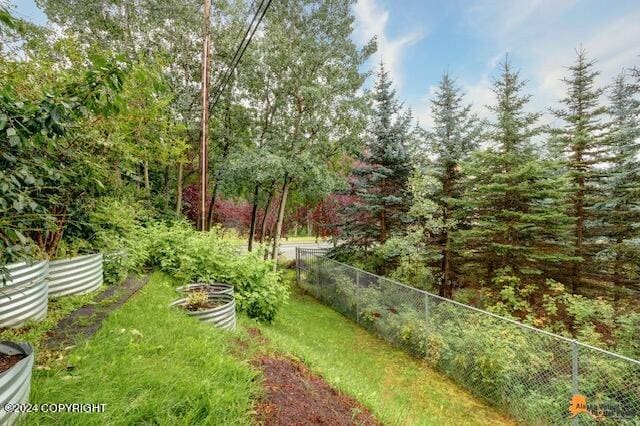 view of yard with fence