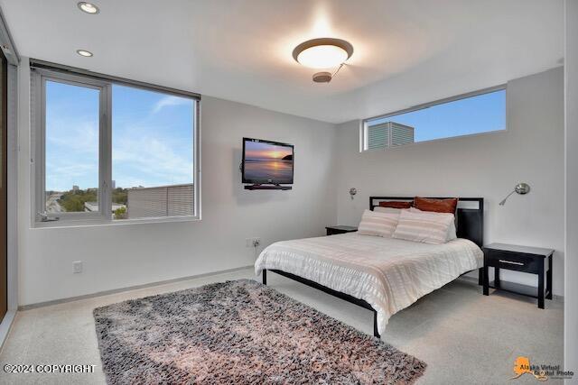 bedroom featuring carpet, baseboards, and recessed lighting