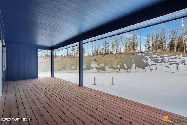 view of snow covered deck