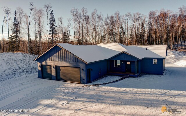 front of property with a garage